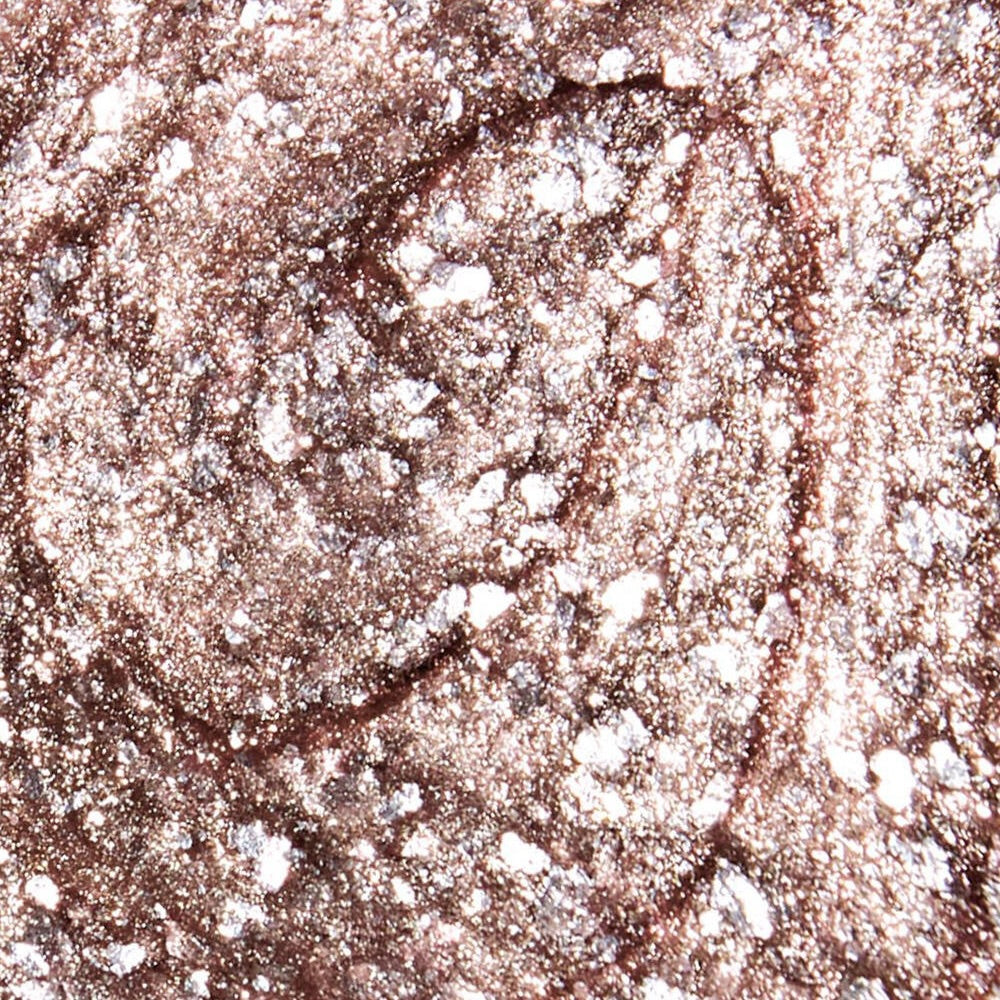 Close-up colour texture swatch of Sally Hansen Miracle Gel Supercharged Bold Glam in Gilded Gossip 204, a lustrous gold metallic finish