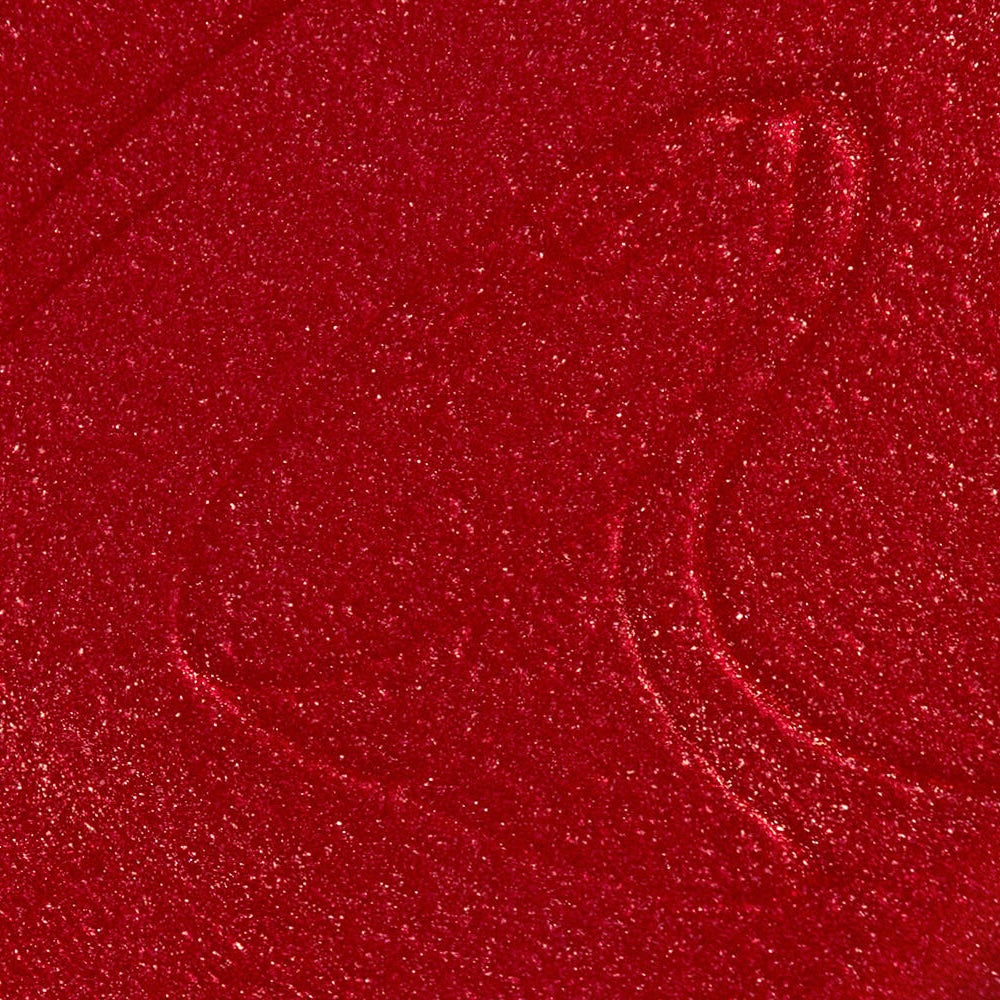 Close-up colour texture swatch of Sally Hansen Miracle Gel Supercharged Bold Glam in XOXO Sally 460, a radiant red pearl finish